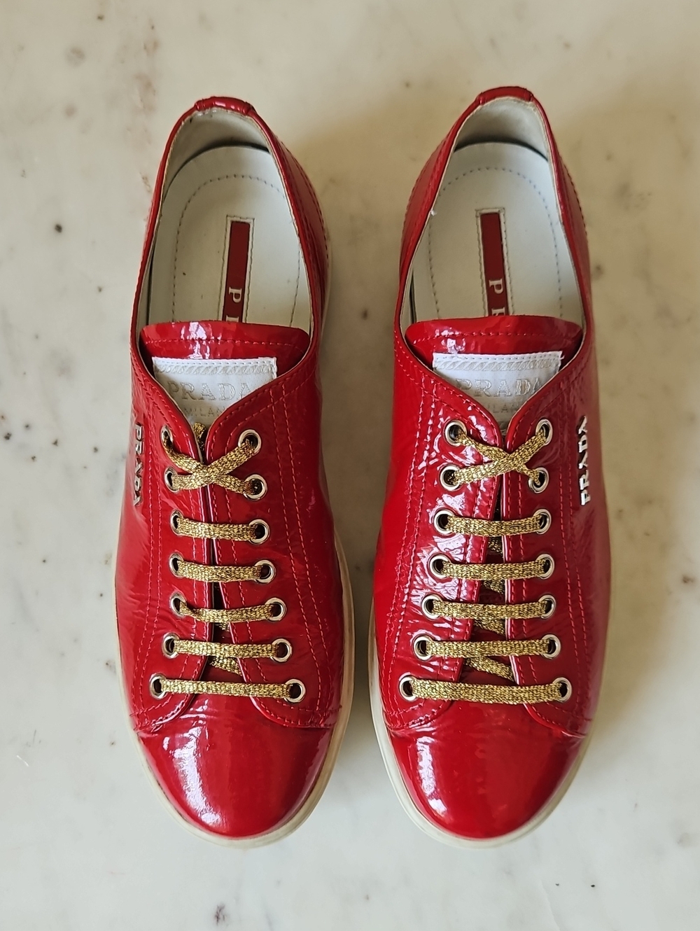 PRADA: Lipstick Red Patent Leather Logo Sneakers
